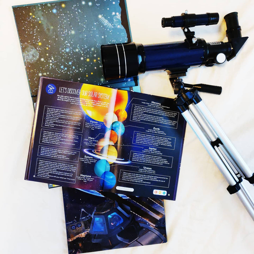 Discover the wonders of Nighttime, it's a interactive non-fiction children science book with sound. Telescope next to the book